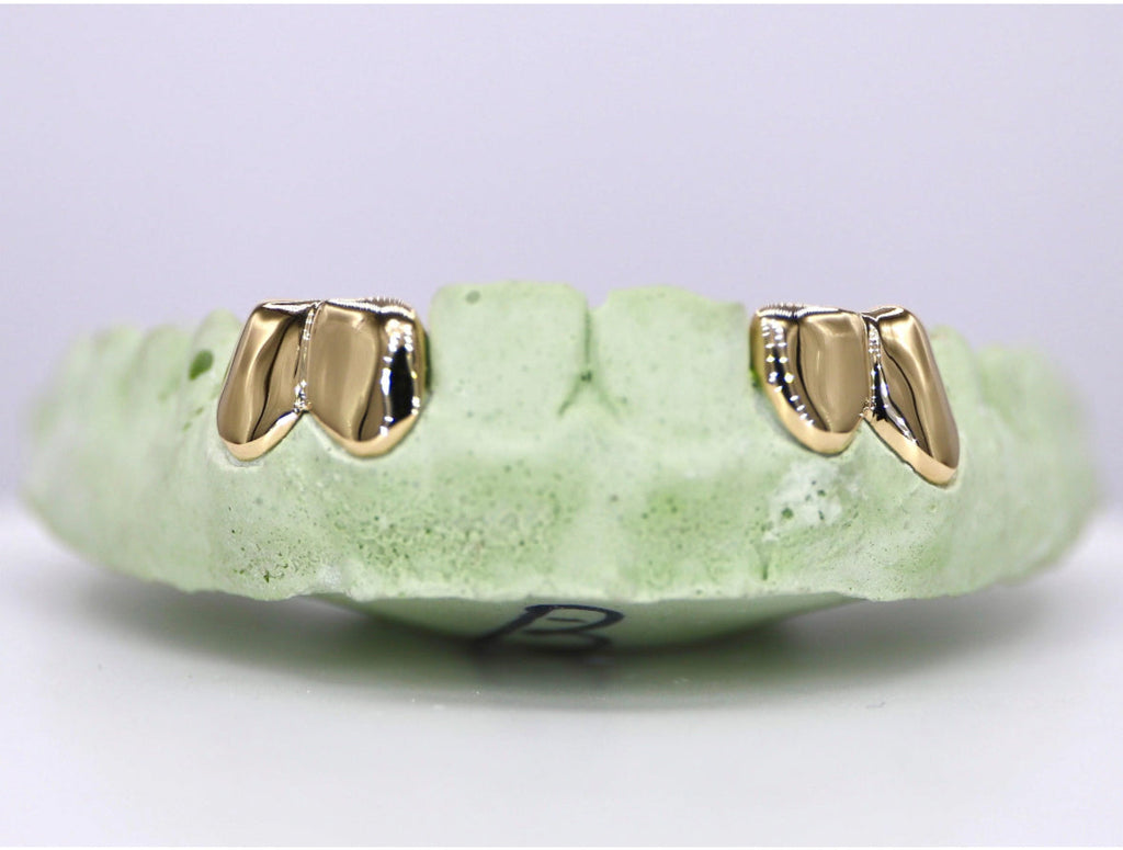 2 Solid 10k Solid Gold Grillz